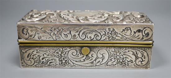 A Victorian repousse silver mounted cased pair of hair curling tongs with burner, Army & Navy Ltd, London, 1899, 13.3cm.
